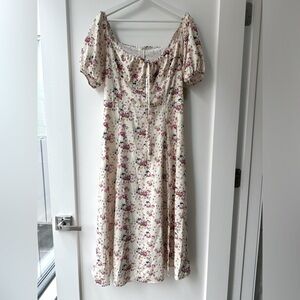 **SOLD*Mid-length floral Summer dress perfect for work, brunch, or any occasion.